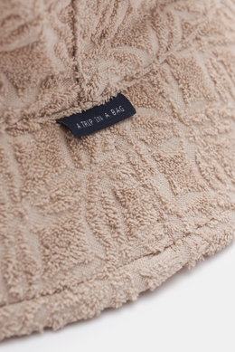04651/ A trip in a bag Frottee-Bucket Hat 'Tile' beige
