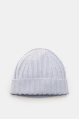 Top-down view of von Braun Cashmere beanie light blue, showcasing fine rib knit pattern, small turn-up, made of pure Mongolian cashmere, very soft feel. Whether worn with a classic winter coat or a highly functional down jacket, this soft VON BRAUN knitte