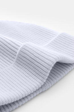 Close-up side view of the light blue von Braun Cashmere beanie showing its fine rib knit pattern and small turn-up cuff, made of pure Mongolian cashmere, very soft feel, perfect with winter coats or down jackets.