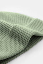 von Braun Cashmere beanie sage shown in close-up from a side angle, featuring pure cashmere, soft feel, fine classic rib knit, and small turn-up.