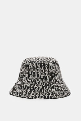 04651/ A trip in a bag Wende-Frottee Bucket Hat schwarz, schwarz-weiß gemustert, schmale Krempe, weiche Baumwolle, wendbar, seitlich Weblabel, Frontansicht.