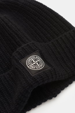 Stone Island Wool Beanie black shown from a close-up side angle, featuring pure wool, soft touch, ribbed knit, wide cuff, and front woven label.