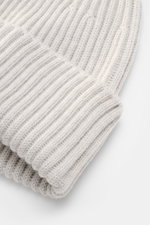 Stone Island Light Grey Melange Wool Beanie close-up from above showing wide cuff, ribbed knit texture, pure wool, soft touch, and STONE ISLAND woven label.
