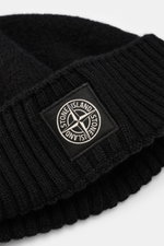Close-up front side view of Stone Island Wool beanie black, showing wide rib-knit cuff with STONE ISLAND woven label, made of pure virgin wool with soft touch.