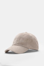 Beige 04651/ A trip in a bag Frottee Baseball-Cap 'Terry' aus Baumwolle mit weichem Griff im Six-Panel-Stil, seitliche Nahaufnahme.