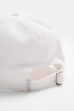 Weiß fotografierte 04651/ A trip in a bag Frottee Baseball-Cap 'Terry' weiß im Six-Panel-Stil mit verstellbarem Verschluss aus Baumwoll-Frottee.