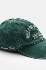 Golden Goose Baseball Cap grey-green shown from front side, vintage cotton twill with logo stitching, star rivets, soft touch, six-panel design, adjustable closure. Authentic style with personality: With a striking vintage design, this cap from GOLDEN GOO