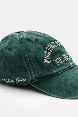 Golden Goose Baseball Cap grey-green shown from front side, vintage cotton twill with logo stitching, star rivets, soft touch, six-panel design, adjustable closure. Authentic style with personality: With a striking vintage design, this cap from GOLDEN GOO