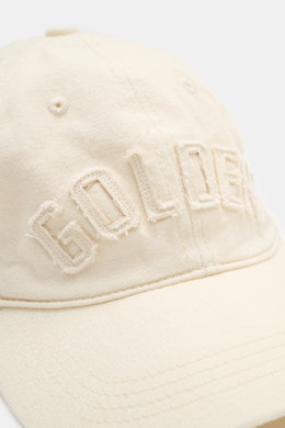 Golden Goose Baseball Cap cream shown from a close-up side angle, featuring twill cotton, soft texture, vintage six-panel design, tonal logo, and star-shaped studs.