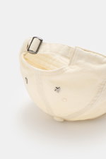 Golden Goose Baseball Cap cream shown from rear close-up, authentic style with vintage twill cotton, star-shaped studs, adjustable closure.