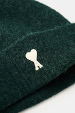 Close-up view of the Ami Paris Beanie dark green showing the soft, elastic rib knit fabric and the white heart logo patch on the wide cuff.

Description: In autumn and winter, this stylish beanie with the typical heart logo by AMI PARIS completes your loo