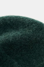 A close-up top view of the Ami Paris Beanie dark green showing the soft, fuzzy texture made of alpaca, wool, and microfiber.