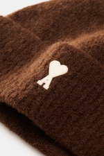 Close-up front-side view of Ami Paris Beanie brown in soft alpaca, wool, microfiber blend with classic rib knit, wide cuff, and white heart logo patch.