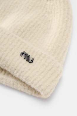 Massimo Osti Studio Beanie sand shown from a close-up front angle, featuring a mix of wool and microfiber, soft feel, classic rib knit pattern, cuff with logo detail.