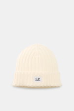 C.P. Company Merino beanie cream shown from front top perspective, made of pure merino wool, soft feel, classic ribbed knit pattern, medium coarse knit texture, cuff with logo patch.