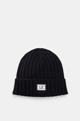 C.P. Company Merino beanie dark navy, top front view, pure merino wool, soft feel, classic ribbed knit pattern, medium coarse knit texture, cuff with logo patch.