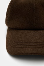 Close-up front view of Officine Générale Wool baseball cap 'Jason Cap Double Split' dark brown, featuring pure wool, soft touch, classic six-panel design, and adjustable closure.