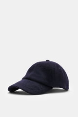 Officine Générale Wool baseball cap 'Jason Cap Double Split' navy shown from a front-left angle, pure wool, soft touch, classic six-panel design, adjustable closure.