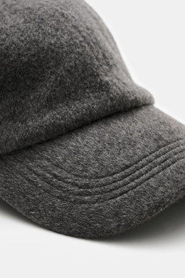 Officine Générale Wool baseball cap 'Jason Cap Double Split' grey melange shown from a close-up front angle, highlighting pure wool, soft touch, classic six-panel design, and adjustable closure.