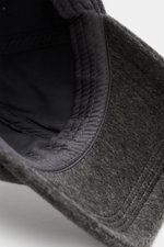 Close-up inside view of the Officine Générale Wool baseball cap 'Jason Cap Double Split' grey melange, showing pure wool fabric, soft touch, classic six-panel design, and adjustable closure.