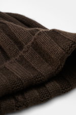 Close-up angled view of the FTC Cashmere beanie dark brown showing its medium-fine rib knit brioche pattern and soft texture.

<p>Luxurious winter accessory: This rib knit beanie in the finest Fair Trade cashmere is a classic no winter wardrobe should be 