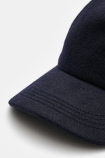 Close-up front-left perspective of Moorer Cashmere Baseball Cap 'Robinson' navy featuring pure cashmere, soft touch, classic six-panel design, soft lining fabric, and adjustable closure.