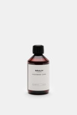 Front view of BRAUN Hamburg Waschmittel 'Cashmere Care' 100 ml in a brown bottle with black cap and white label, gentle cashmere and wool detergent.

Description: <p>Hochwertige Pflege für Ihre Cashmere- und Wollprodukte: Das 'Cashmere Care' Waschmittel m