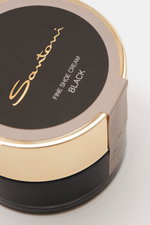 Santoni Schuhcreme schwarz 50 ml, Nahaufnahme von oben schräg, schwarze Dose mit goldfarbenem Deckel, Pflegecreme für Glattleder, Farb- und Glanzauffrischung, Made in Italy.