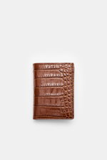 Tom Ford Portemonnaie braun aus edlem Kalbleder im Reptilien-Look, frontale Draufsicht, dezente Logo-Prägung, kompakt und elegant.
