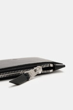 Close-up side view of Ami Paris Card holder black in finely grained calf leather with silver zipper pull and logo.

Description:  
<p>Stylish everyday accessory: This card holder from AMI PARIS impresses with timeless design and keeps your most important 
