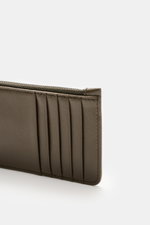 Close-up side view of Ami Paris Card holder khaki in finely grained calf leather showing five card slots and stitched edges.

<p>Stylish everyday accessory: This card holder from AMI PARIS impresses with timeless design and keeps your most important cards