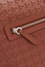 Close-up front view of Serapian Weekender brown showing butter-soft Napa leather in exclusive 'Mosaico' weave with silver zip hardware.

<p>Luxuriously equipped for business and leisure travel: The butter-soft Napa leather of this sophisticated travel bag