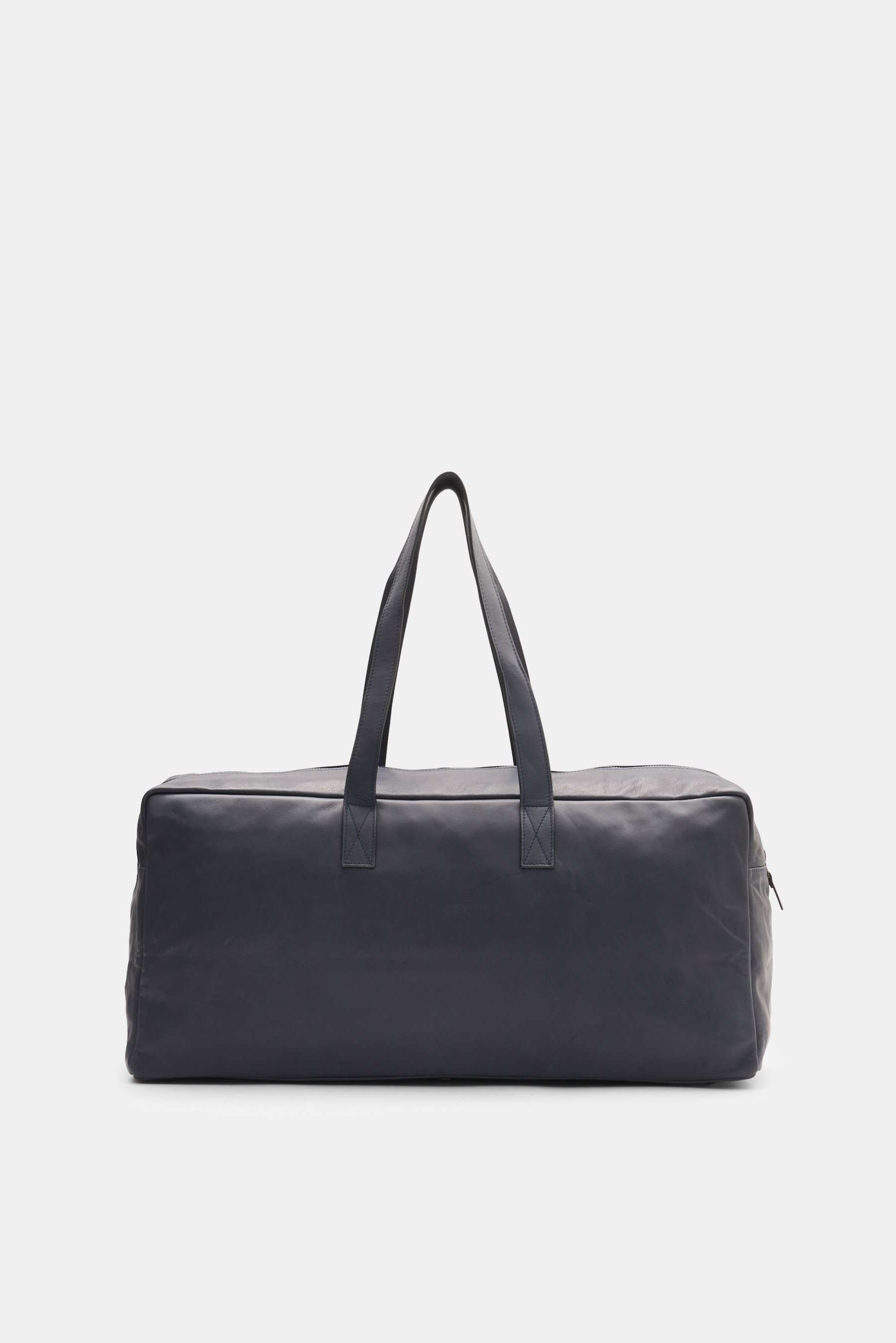 Frontansicht des Weekender 'Nubuck' navy 04651/ A trip in a bag aus geschmeidigem Nubukleder mit robusten Tragegriffen und brünierter Hardware.