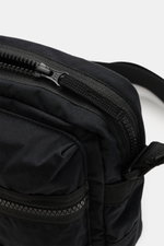 Close-up front view of Stone Island Crossbody Bag 'Marsupio Tracolla' schwarz in black cotton popeline with aluminum membrane, showing adjustable strap, multiple zippered compartments, and iconic Windrose patch. Practical and stylish, compact and robust f