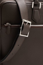 Close-up side view of Serapian Briefcase dark brown showing distinctively grained calf leather, silver buckle, zipper, and strap details.

Description: <p>Exquisite leather quality and first-class manufacturing combine in this briefcase from SERAPIAN to c