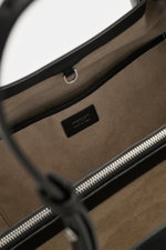 Inside view of the Serapian Shopper schwarz showing beige suede interior, zippered compartment, and silver hardware from top perspective. For this luxurious shopper, SERAPIAN uses finest cashmere leather quality and artfully refines it in the characterist