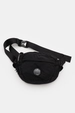 C.P. Company Belt bag black shown from above, compact, piece-dyed, water repellent microfibre with adjustable strap and signature lens.