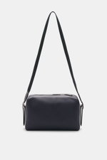 Front view of The Row Crossbody bag 'Jerome' navy in finely grained leather with adjustable strap, embossed logo, and zippered pocket, 28x20x14 cm.