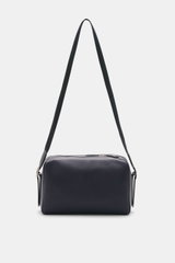 Front view of The Row Crossbody bag 'Jerome' navy in finely grained leather with adjustable strap, embossed logo, and zippered pocket, 28x20x14 cm.