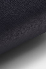 Close-up side view of The Row Crossbody bag 'Jerome' navy, showing finely grained leather and embossed logo.

<p> Stylish eye-catcher from THE ROW: The practical crossbody bag impresses with timeless design and becomes the ideal companion for urban looks 