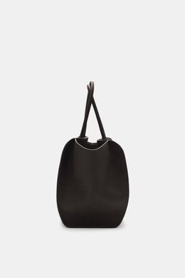 The Row Tote bag 'Marlo' dark brown shown from a front view, made of finely grained leather, spacious with zippered and slip pockets, embossed logo, soft cotton lining, approx. 43x20x31 cm. Stylish all-rounder by THE ROW: The practical tote bag impresses 