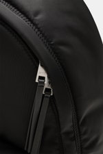 Close-up view of Ami Paris Backpack 'Marcel' black showing water-repellent canvas, silver zippers with logo, and smooth leather details, highlighting quality microfiber. Features include smooth handle, adjustable padded shoulder straps, large front pocket