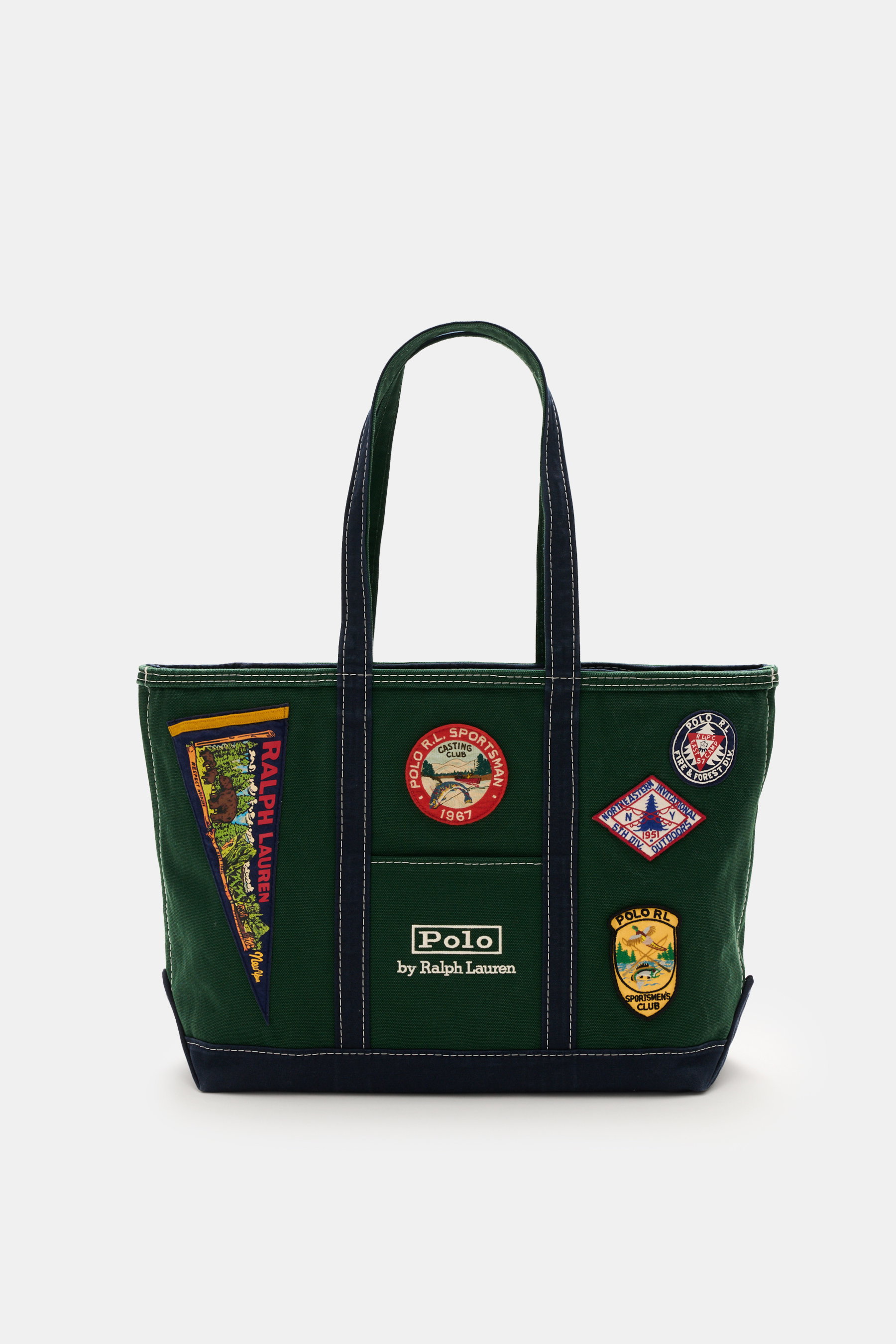 Polo Ralph Lauren Shopper dunkelgrün/navy, frontal fotografiert, Canvas aus reiner Baumwolle, strapazierfähige Tragegriffe, Außentasche, Stick-Logo, Patch-Details, Hauptfach mit Zipper, zwei Innenfächer, ungefüttert, ca. 57x34x19 cm.