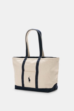 Polo Ralph Lauren Shopper creme/navy aus Canvas Baumwolle, seitlich fotografiert, mit robusten Tragegriffen, Außentasche, Stick-Logo, zwei Innenfächern, Zipper, Maße ca. 57x34x19 cm.