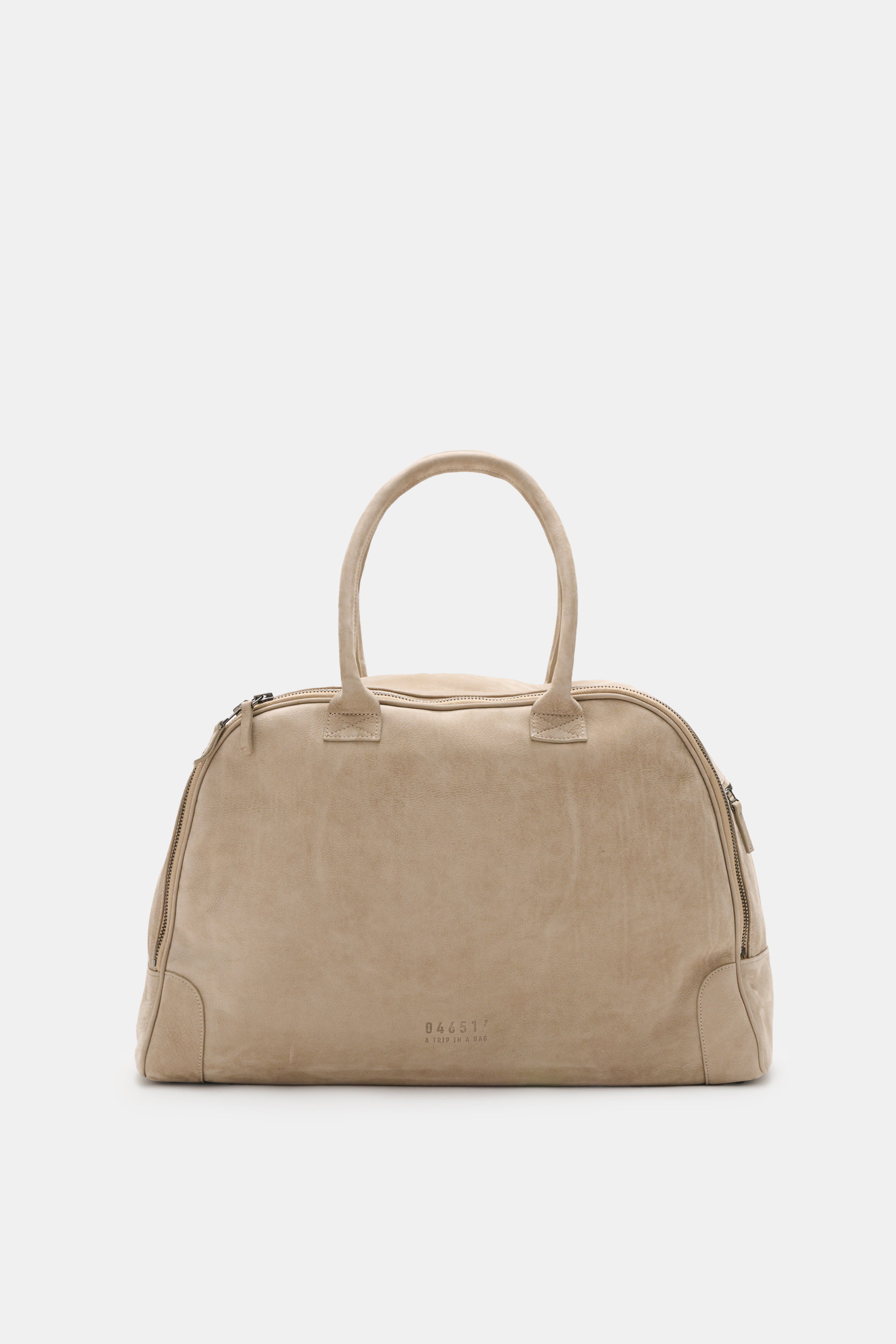 Front view of the 04651/ A trip in a bag Weekender '356 Bag' beige in fine suede with silver hardware and embossed logo.