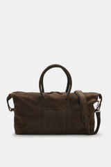 Front view of the 04651/ A trip in a bag Weekender '3 Day Bag' dark brown made of soft nubuck leather, featuring silver-colored hardware, robust carrying handles, a two-way zipper, 04651/- embossing on the front, a small address compartment, spacious main