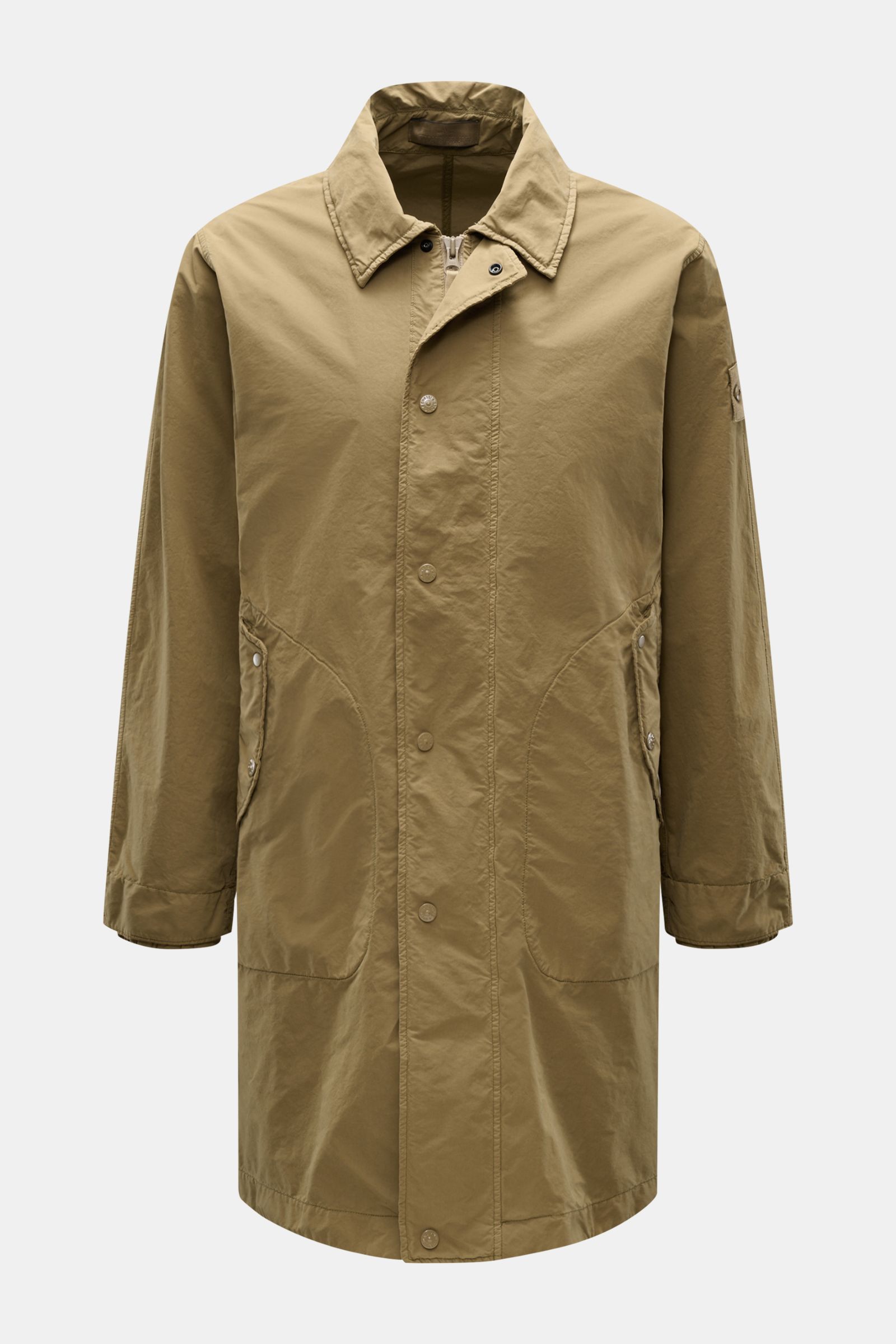 Stone Island Coat 'Ghost Piece' khaki shown from the front, lightweight, slim fit, water repellent microfibre with turn-down collar and snap button pockets.