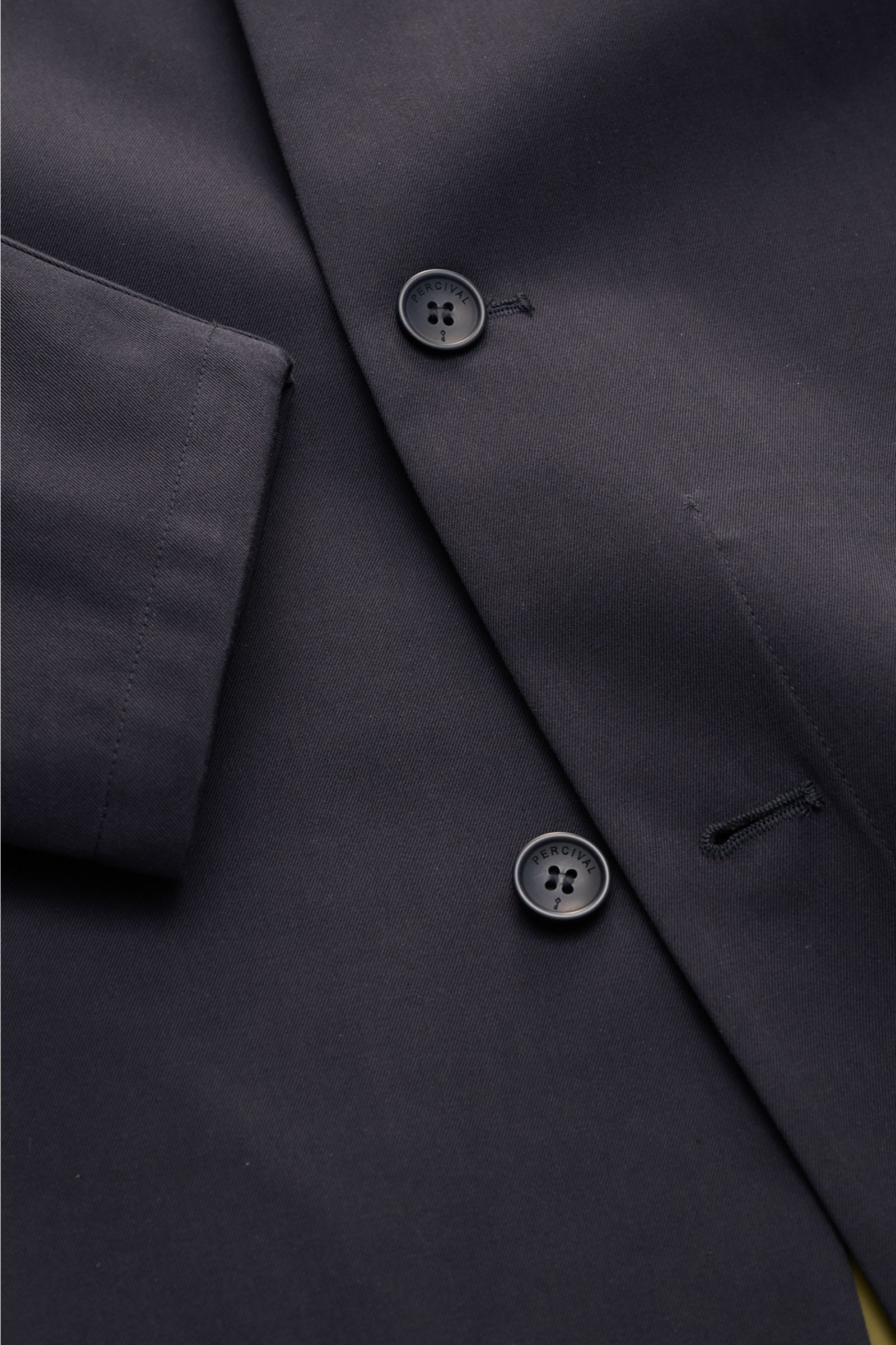 Close-up front view of the Percival Kurzmantel 'Sherlock' dark navy, a waterproof short coat with five-button placket and unconstructed design, made from cotton-microfiber twill with sealed seams and C0-DWR eco-friendly coating.