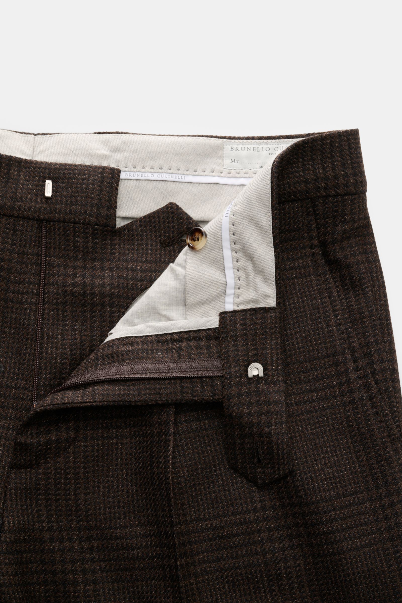 Brunello Cucinelli Anzug schwarz/braun kariert, Detailansicht der Hose mit Reißverschluss, Bundhaken, Bundknopf, Glencheck aus Wolle, Cashmere, Seide.