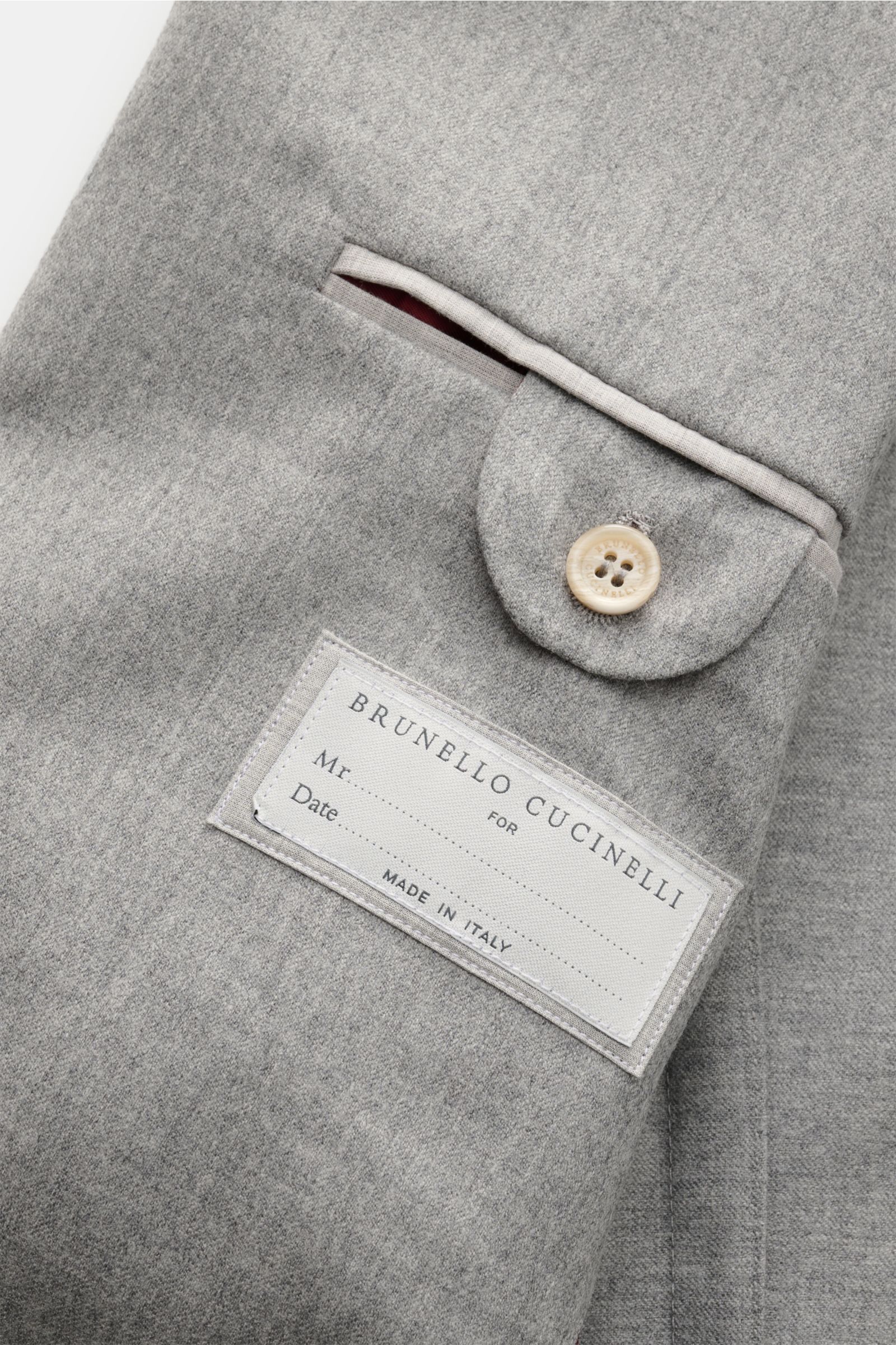 Brunello Cucinelli Wollanzug grau meliert, Detailansicht Innenfutter mit Etikett, weiche Schurwolle, Slim Fit Sakko, Leisure Fit Hose.